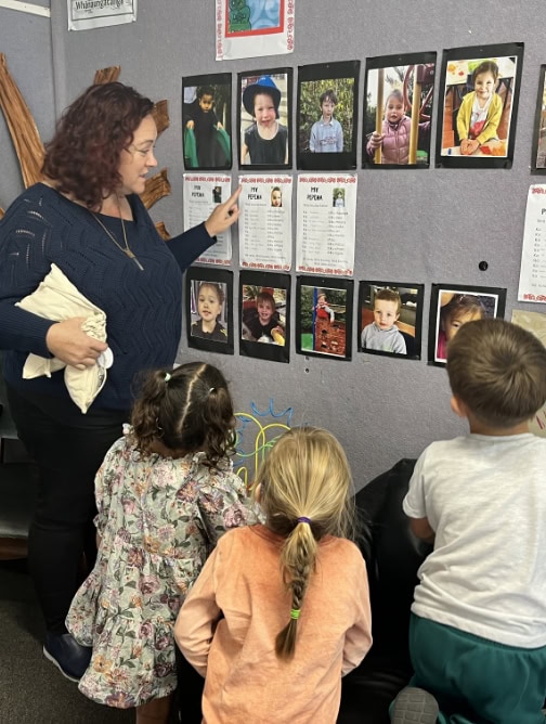 Children looking at wall